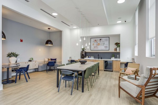 Clubhouse with modern decor at Landmark Apartments, featuring spacious seating areas and stylish design for resident gatherings
