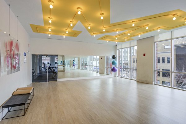 Bright yoga and spin studio at Landmark Apartments with state-of-the-art equipment for fitness enthusiasts