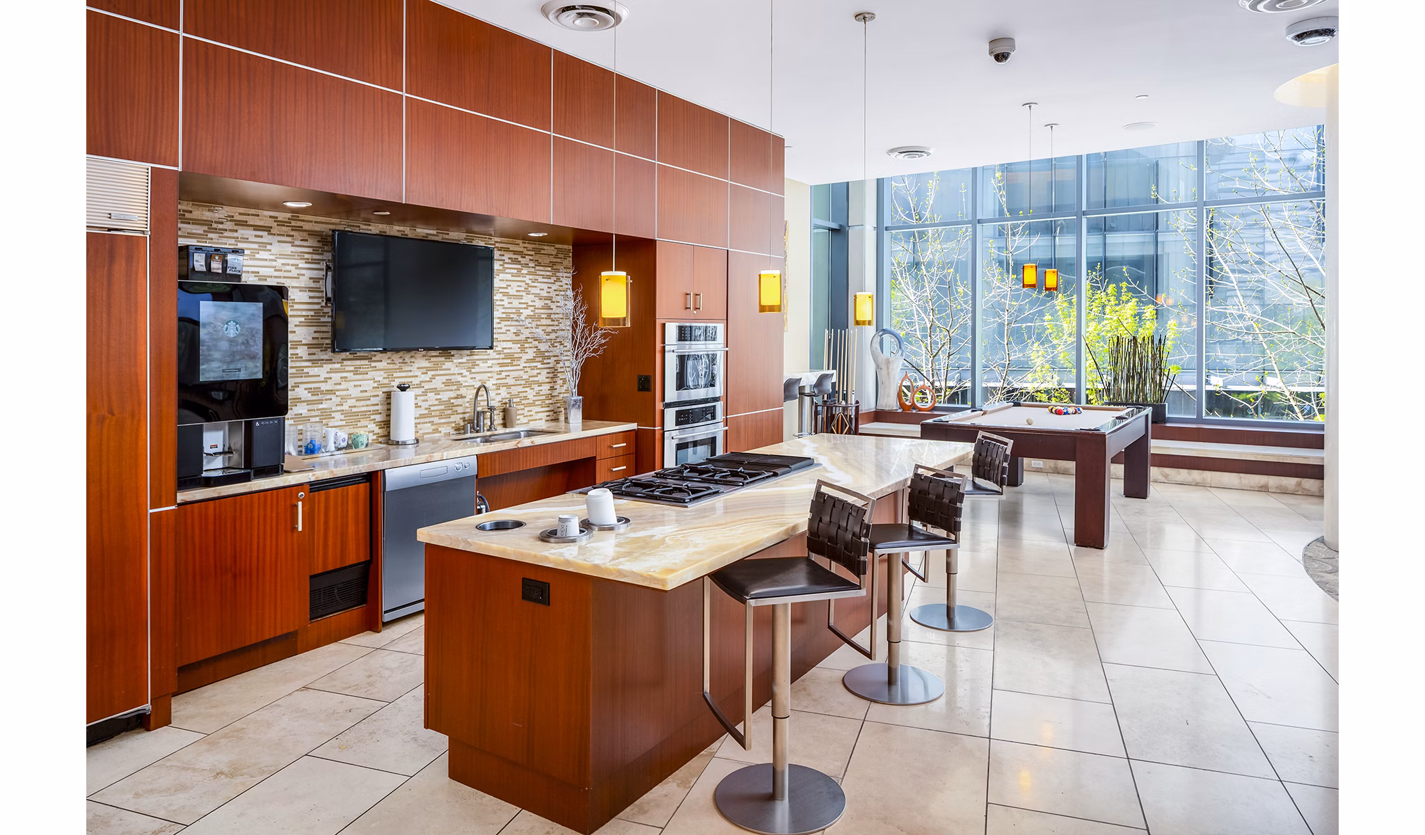 The Olivian Apartments: Stylish clubhouse with billiards and game consoles in luxury downtown setting