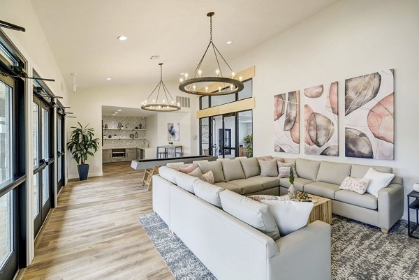Clubhouse with modern design elements at Artemis at Spring Canyon Apartments