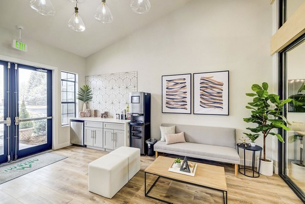 Clubhouse with modern design and ample seating at Artemis at Spring Canyon Apartments