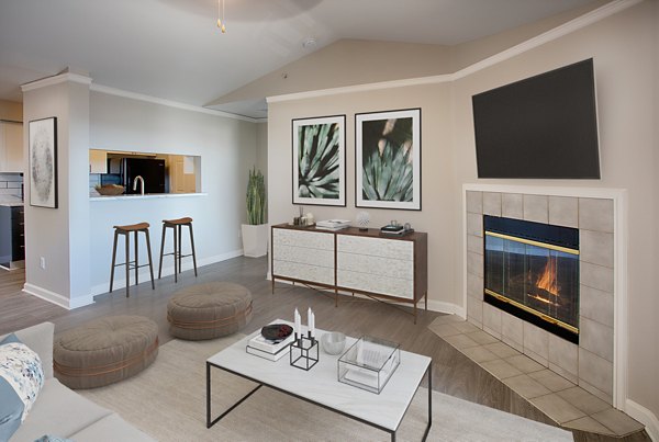Elegant living room with modern decor at Artemis at Spring Canyon Apartments