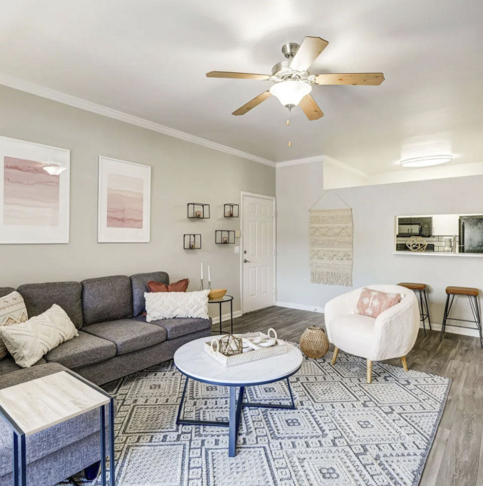living room at Artemis at Spring Canyon Apartments