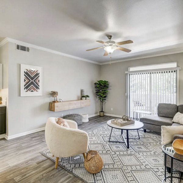 living room at Artemis at Spring Canyon Apartments