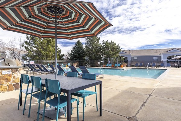 pool patio at Artemis at Spring Canyon Apartments