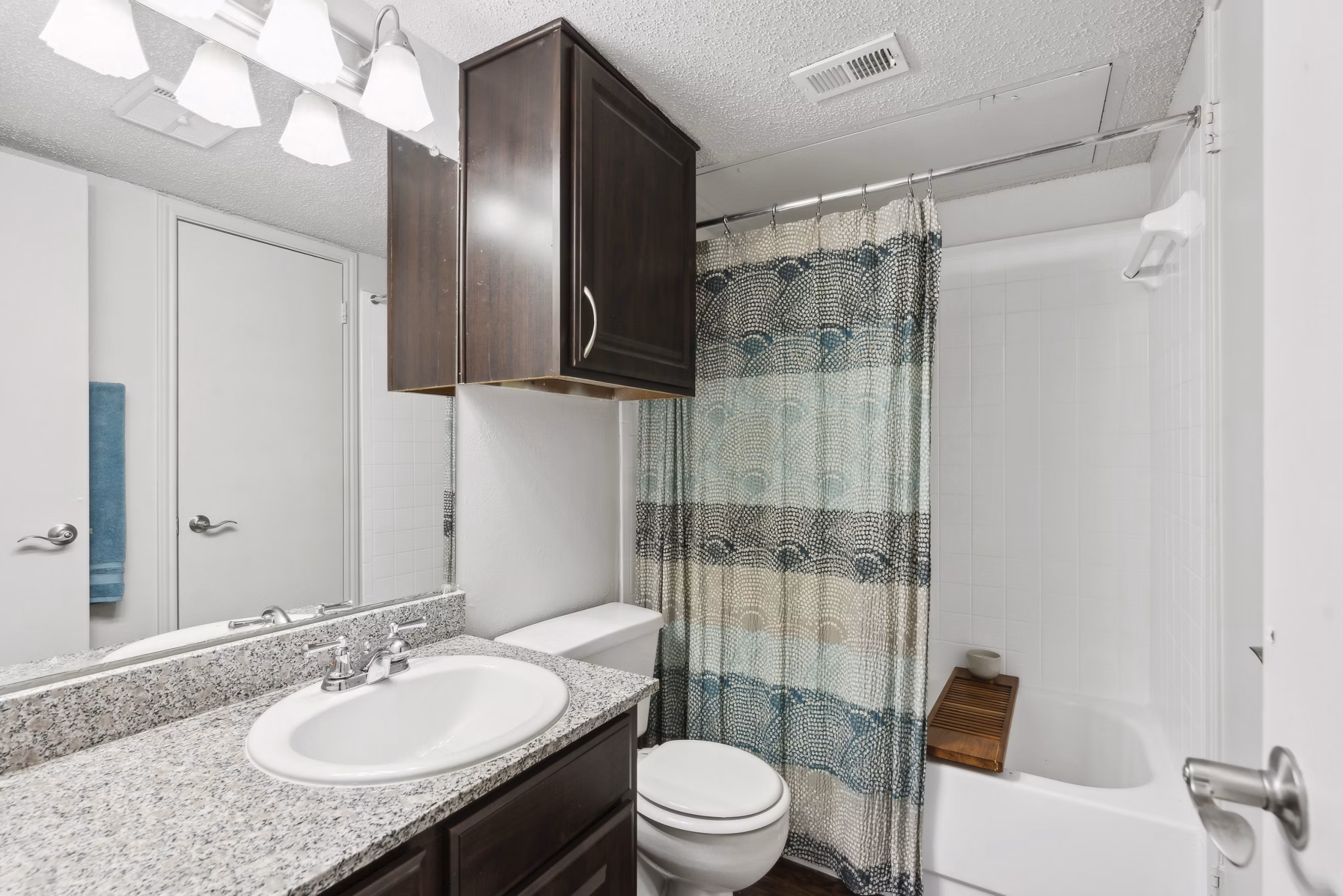Spacious bathroom featuring modern fixtures at Townlake of Coppell Apartments