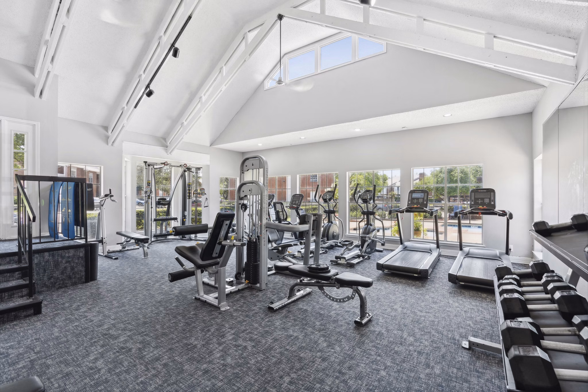 Modern fitness center with state-of-the-art equipment at Townlake of Coppell Apartments, luxury living community in Coppell
