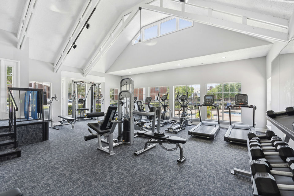 Modern fitness center with state-of-the-art equipment at Townlake of Coppell Apartments, luxury living community in Coppell