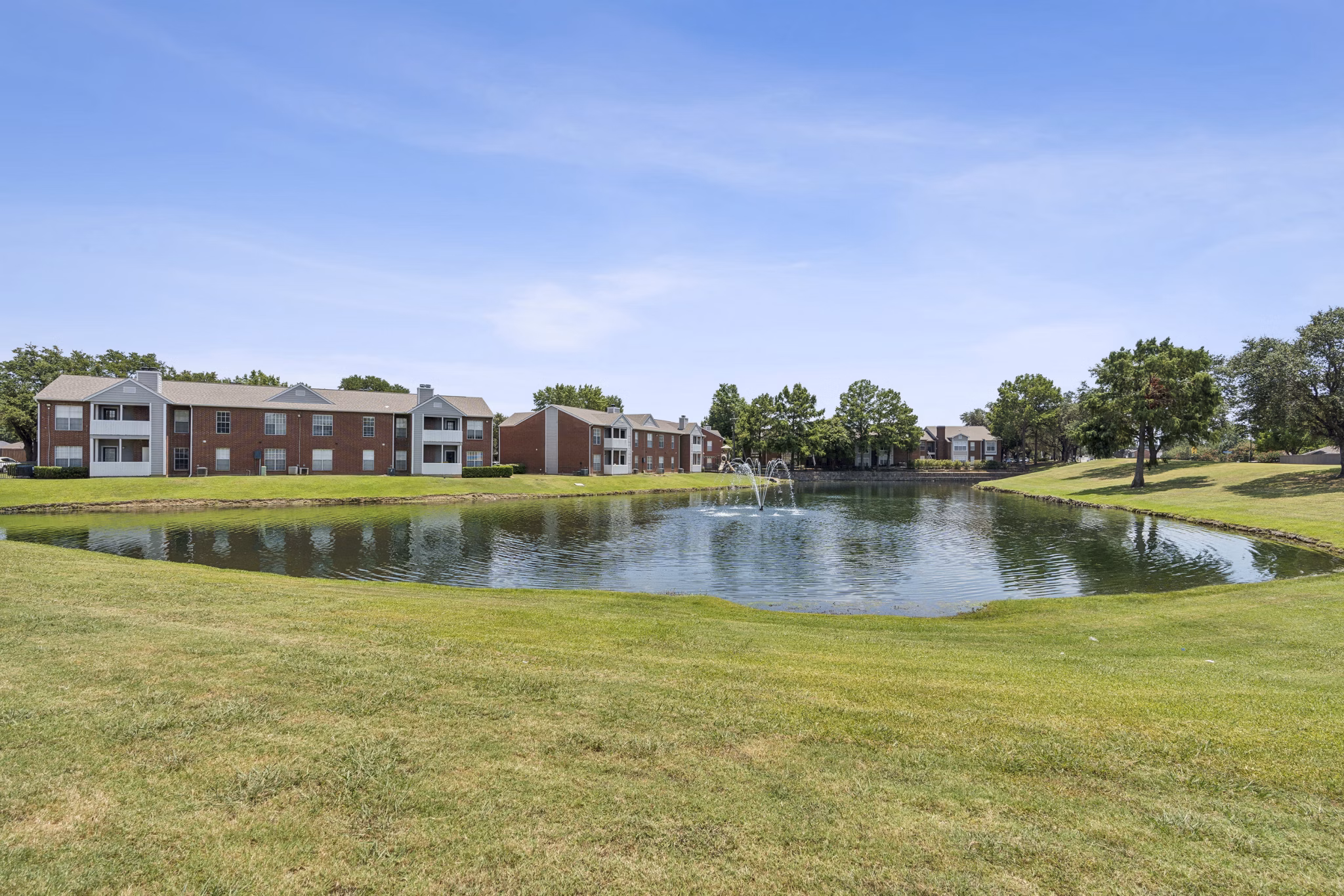 Beautiful pond view at Townlake of Coppell Apartments' luxury community
