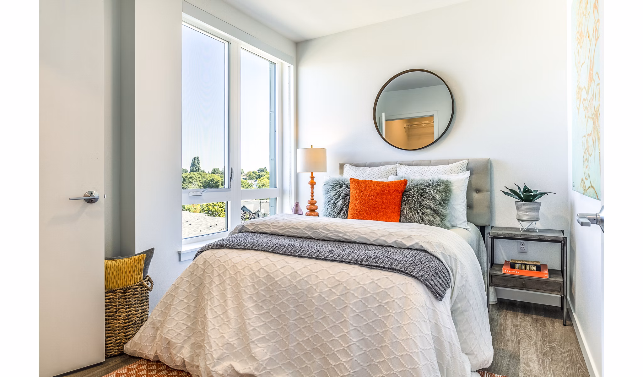 Cozy bedroom with elegant decor at Jackson Apartments