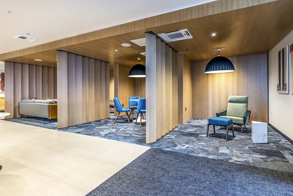 Contemporary clubhouse with modern furnishings at Jackson Apartments luxury community
