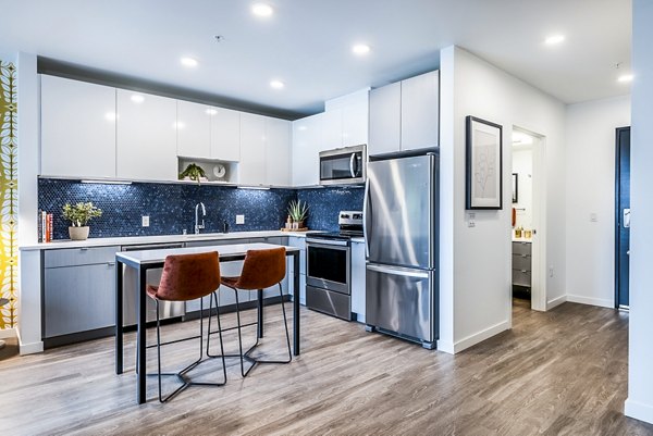 Elegant kitchen with modern appliances at Jackson Apartments