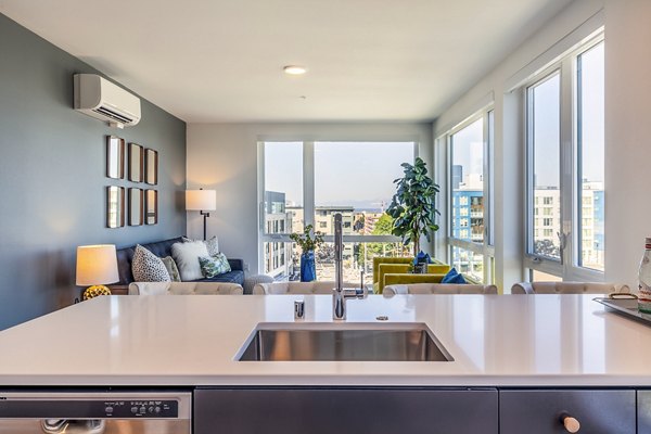Modern kitchen design with sleek countertops and stainless steel appliances at Jackson Apartments