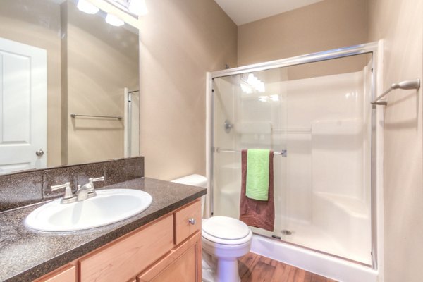 Modern bathroom with sleek fixtures at Bradley Park Apartments