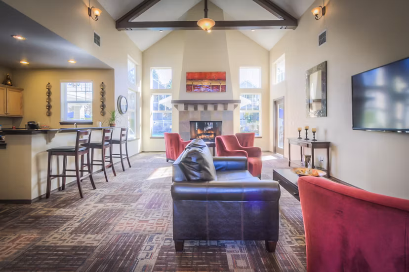 Contemporary clubhouse with cozy seating at Bradley Park Apartments