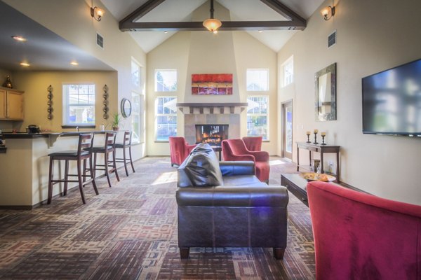 Contemporary clubhouse with cozy seating at Bradley Park Apartments