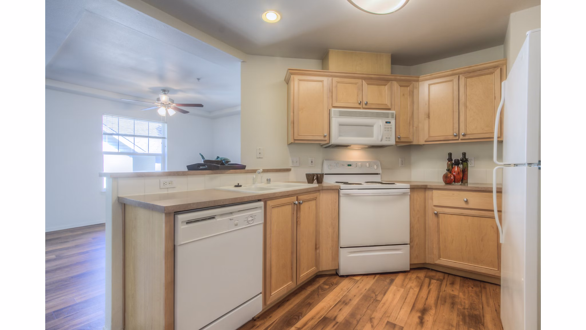 Modern kitchen featuring stainless steel appliances at Bradley Park Apartments