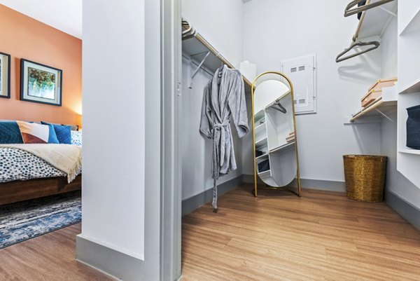 Modern bedroom with stylish decor at Rhythm Apartments