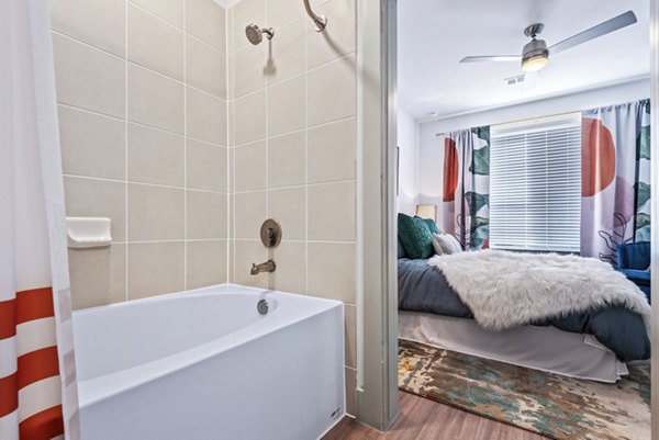 Bathroom with modern fixtures at Rhythm Apartments
