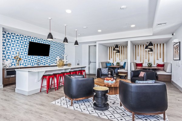 Modern clubhouse lobby with sleek decor at Rhythm Apartments