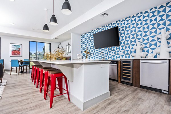 Clubhouse lobby with modern dÃ©cor at Rhythm Apartments