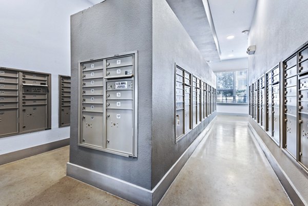 Mail room with stylish decor at Rhythm Apartments clubhouse