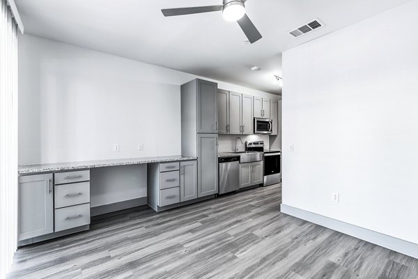 Elegant dining room with modern furnishings at Rhythm Apartments
