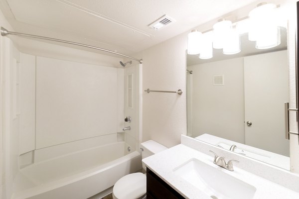 Modern bathroom with sleek fixtures in Copper Ridge Apartments, featuring luxury design elements, perfect for comfortable living