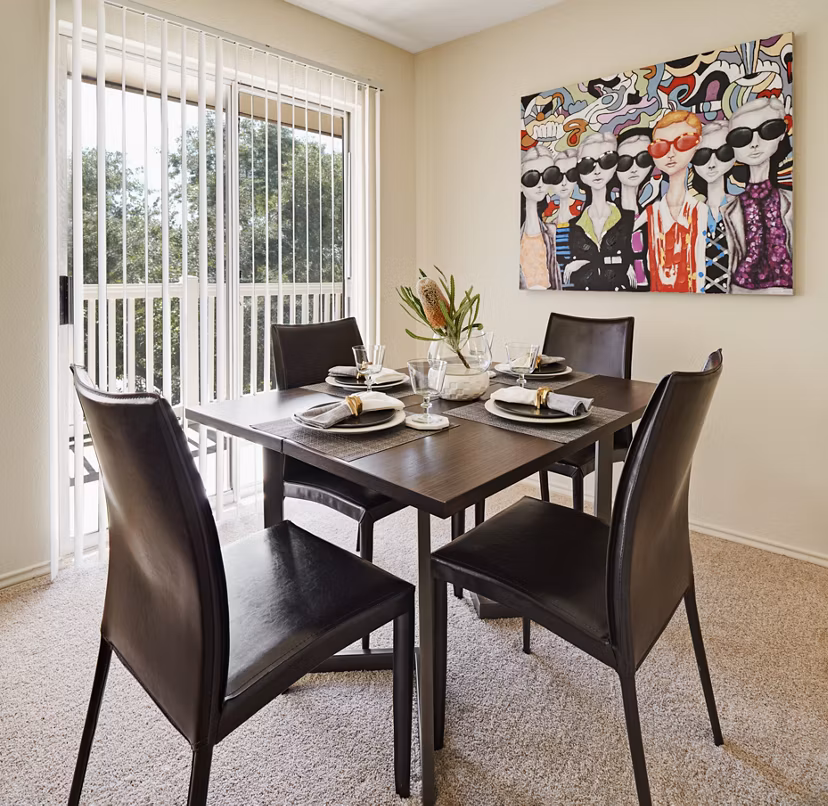 Dining area featuring modern furnishings and pendant lighting in Copper Ridge Apartments