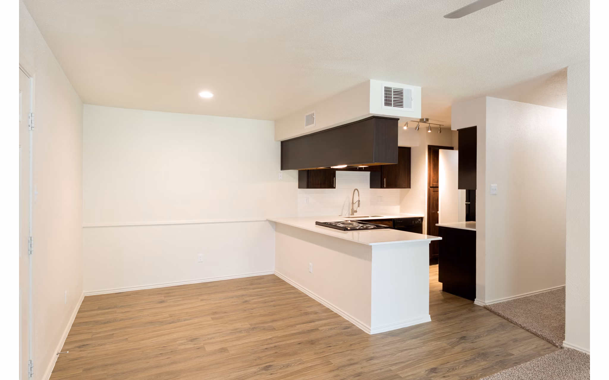 Dining area with modern decor and stylish lighting at Copper Ridge Apartments