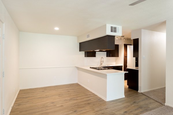 Dining area with modern decor and stylish lighting at Copper Ridge Apartments