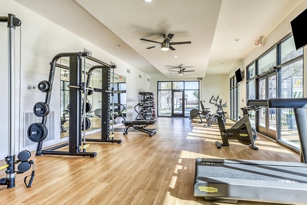 State-of-the-art fitness center with modern gym equipment at Copper Ridge Apartments