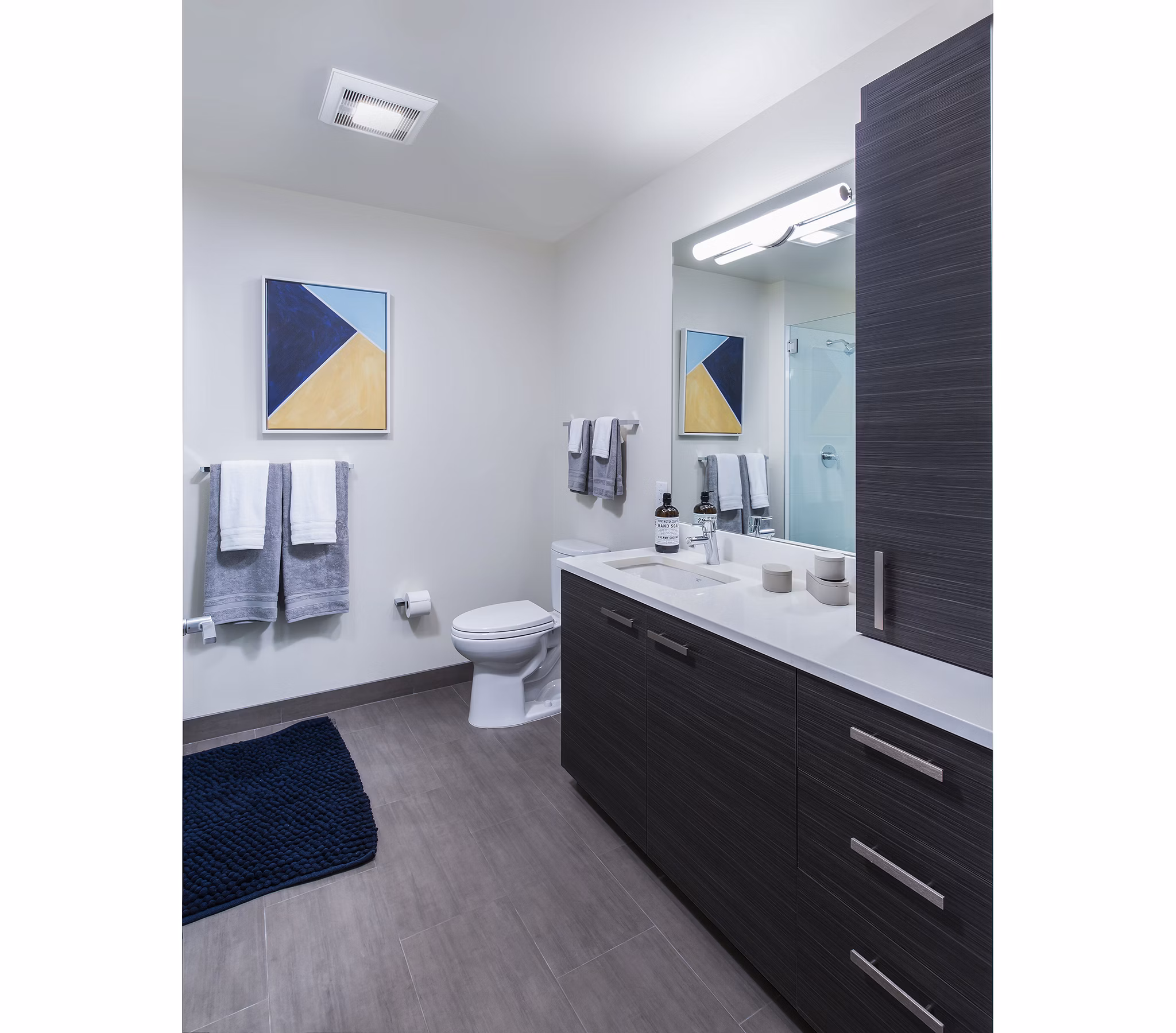 Modern bathroom with sleek fixtures at West Edge Apartments, featuring elegant design and contemporary amenities suitable for urban living