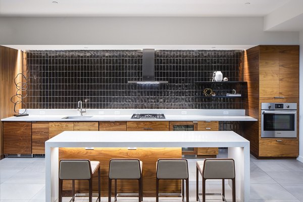 Clubhouse featuring modern decor and seating areas at West Edge Apartments