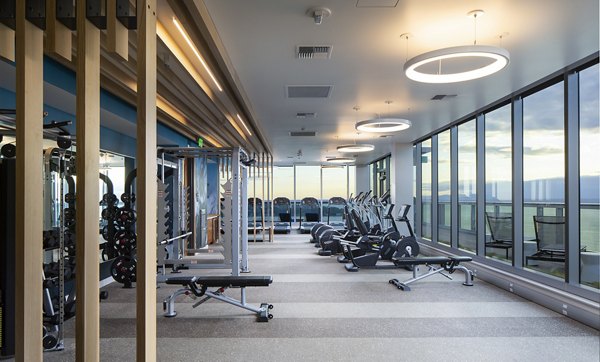 State-of-the-art fitness center at West Edge Apartments featuring modern exercise equipment and spacious workout areas Ideal for urban living enthusiasts