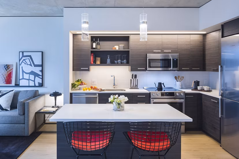 Modern kitchen with stainless steel appliances at West Edge Apartments in Greystar luxury living portfolio