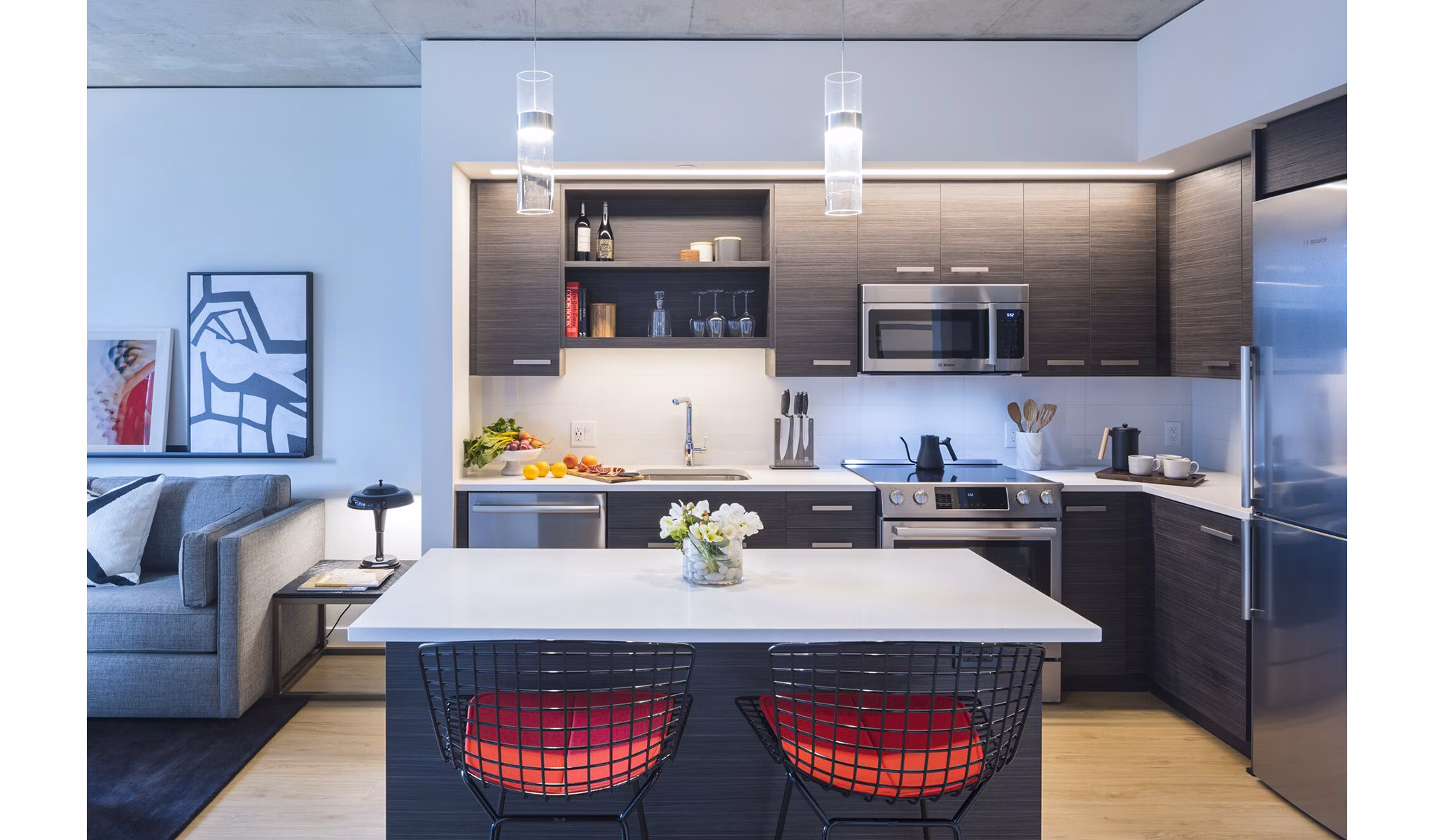 Modern kitchen with stainless steel appliances at West Edge Apartments in Greystar luxury living portfolio