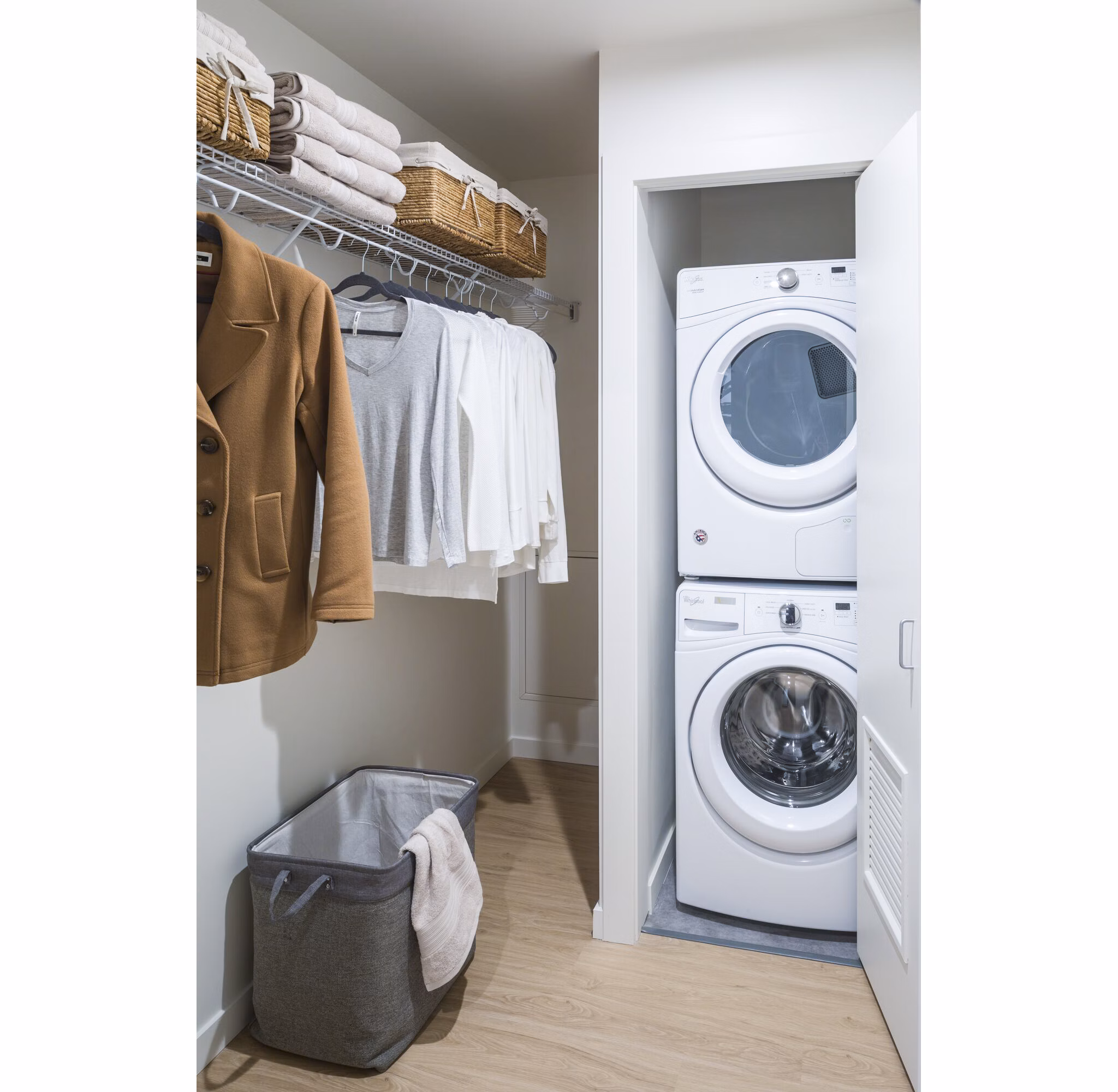 Modern laundry room with front-loading machines at West Edge Apartments, Greystar luxury apartments in a vibrant urban setting