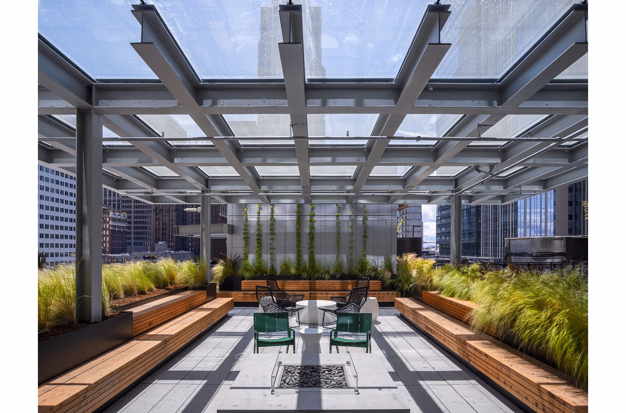 Outdoor patio with stunning city skyline views at West Edge Apartments