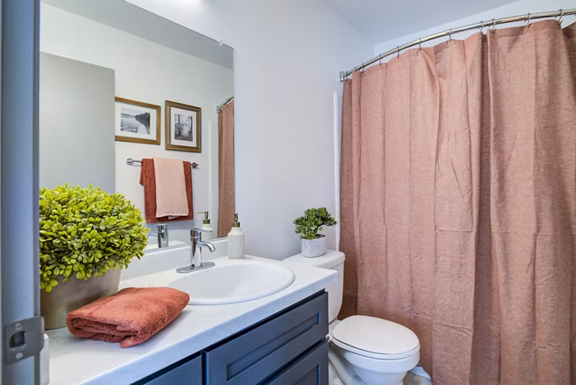 Spacious bathroom with modern fixtures at Lumen Apartments, Greystar luxury apartments