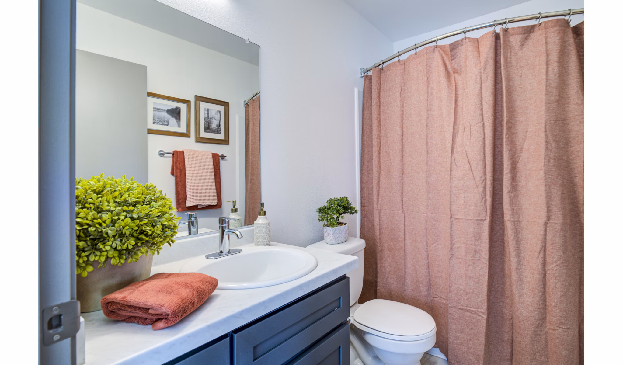 Spacious bathroom with modern fixtures at Lumen Apartments, Greystar luxury apartments