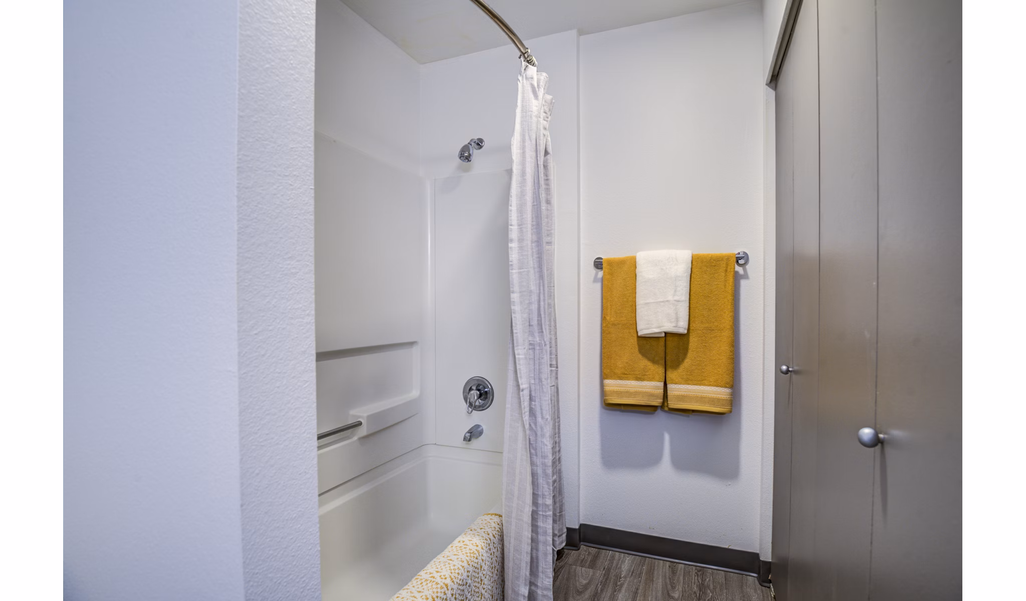 Modern bathroom with sleek fixtures at Lumen Apartments