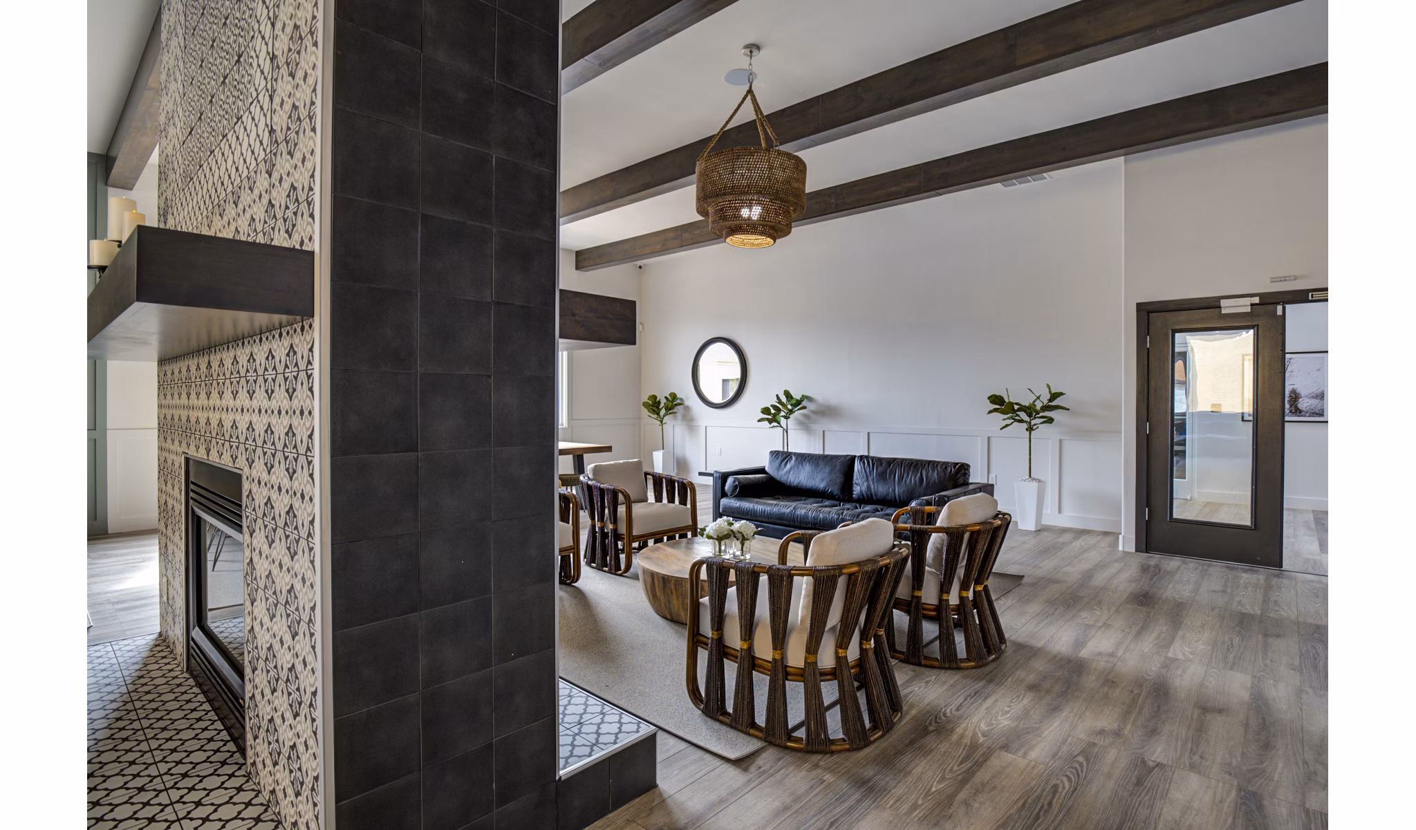 Lumen Apartments: Modern clubhouse with elegant design and cozy seating areas in vibrant downtown community