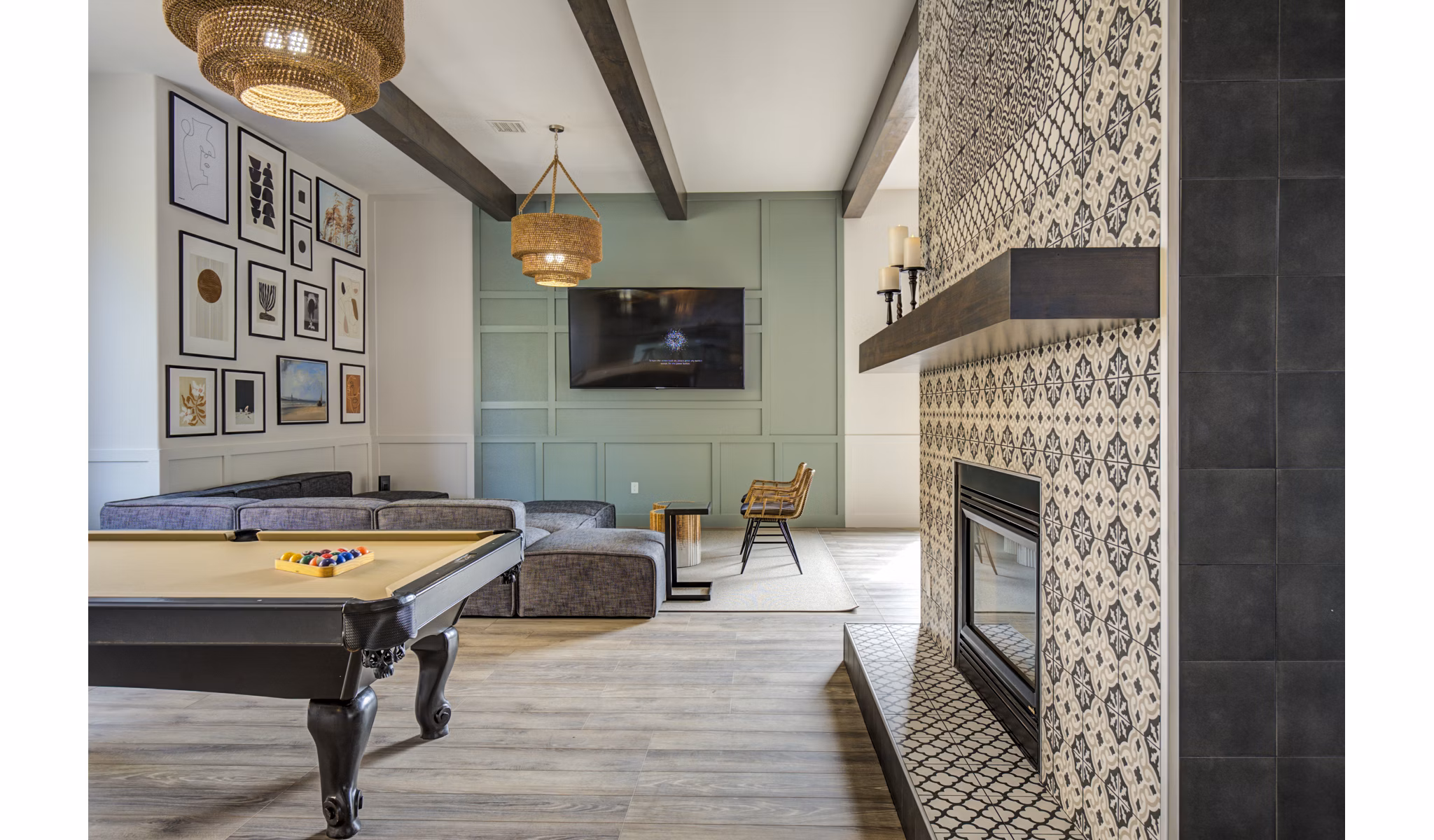 Lumen Apartments: Clubhouse game room with modern seating and billiards table, perfect for relaxing and socializing in a luxury environment
