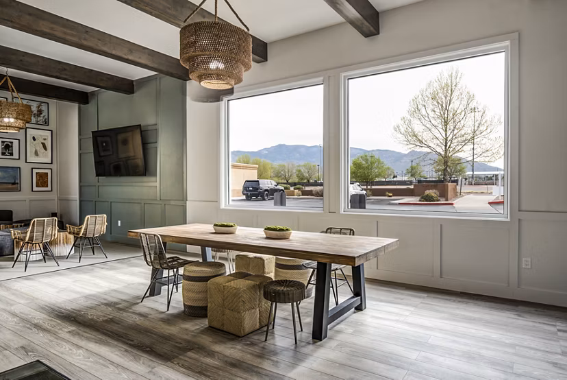 Modern clubhouse with stylish decor at Lumen Apartments, offering luxury living with premium amenities in a vibrant community setting