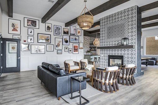 Clubhouse featuring modern design and cozy lounge areas at Lumen Apartments