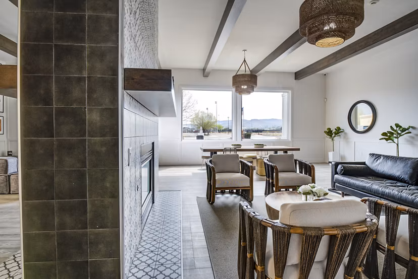 Modern clubhouse at Lumen Apartments featuring luxurious seating and entertainment space