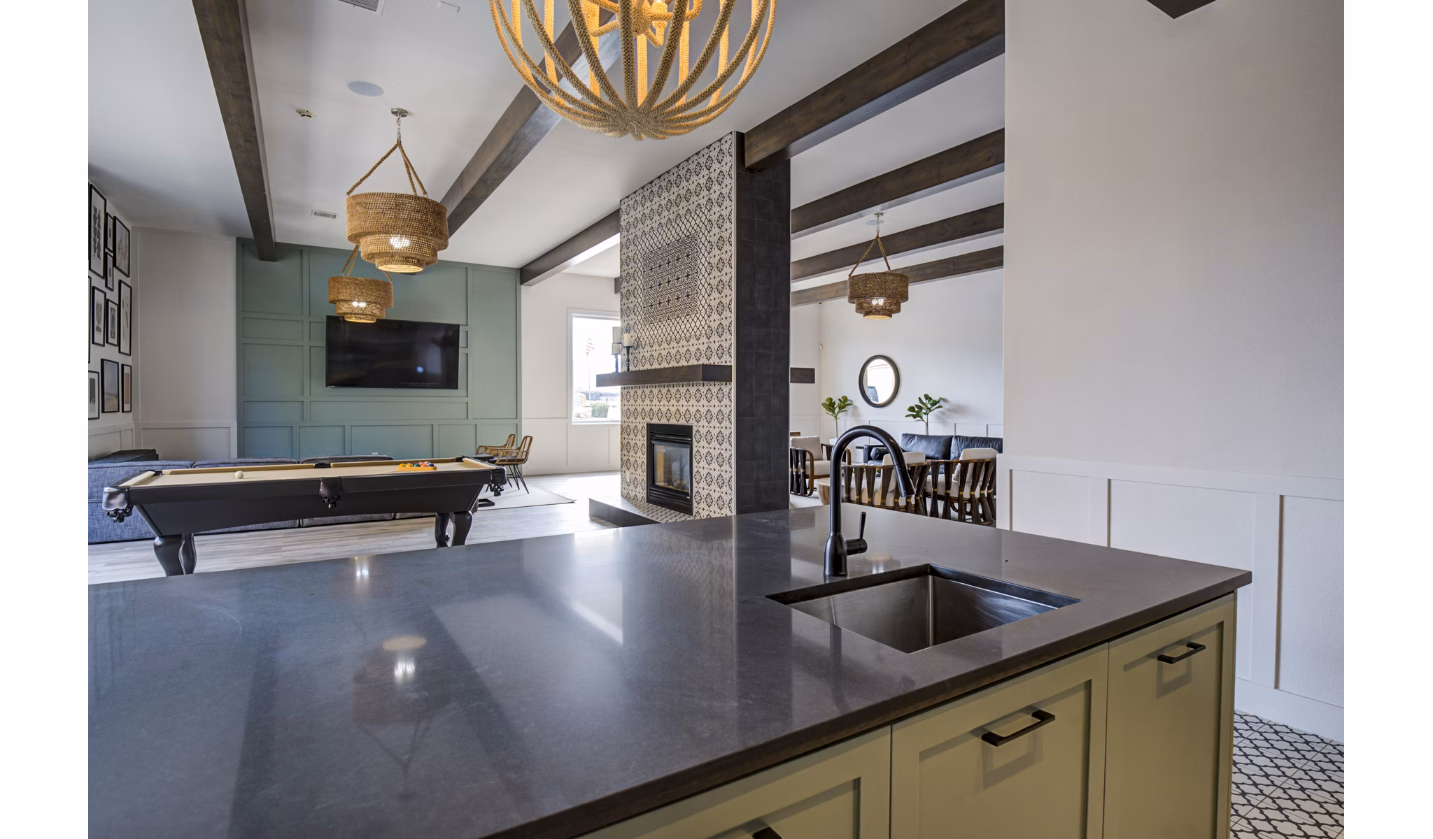 Chic clubhouse bar with modern decor at Lumen Apartments