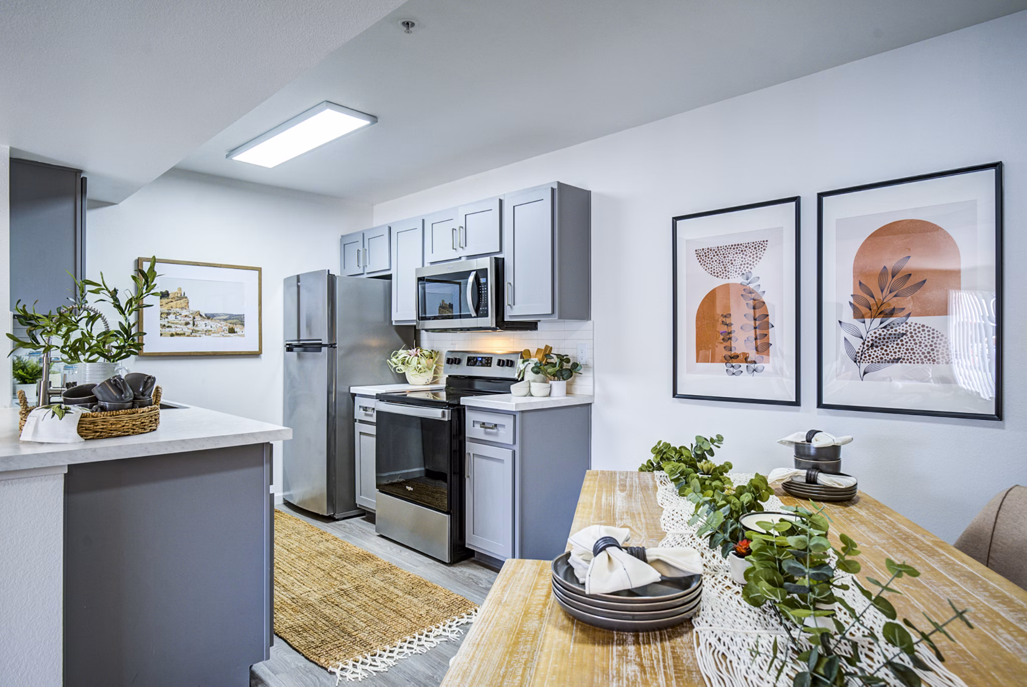Dining area featuring modern decor and ample seating at Lumen Apartments in a luxury setting