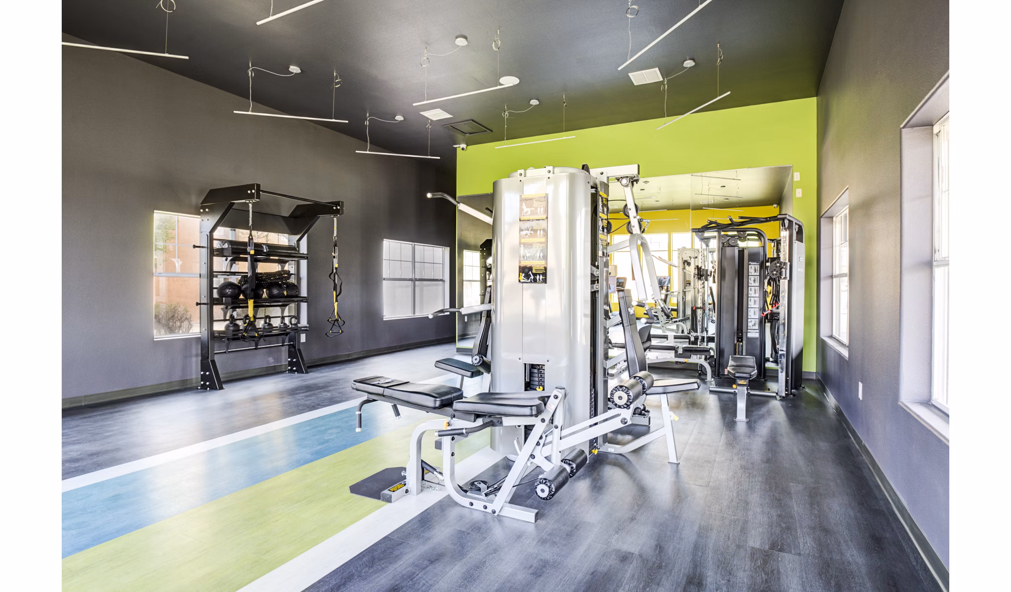 Modern fitness center with state-of-the-art equipment at Lumen Apartments, perfect for active residents seeking a healthy lifestyle